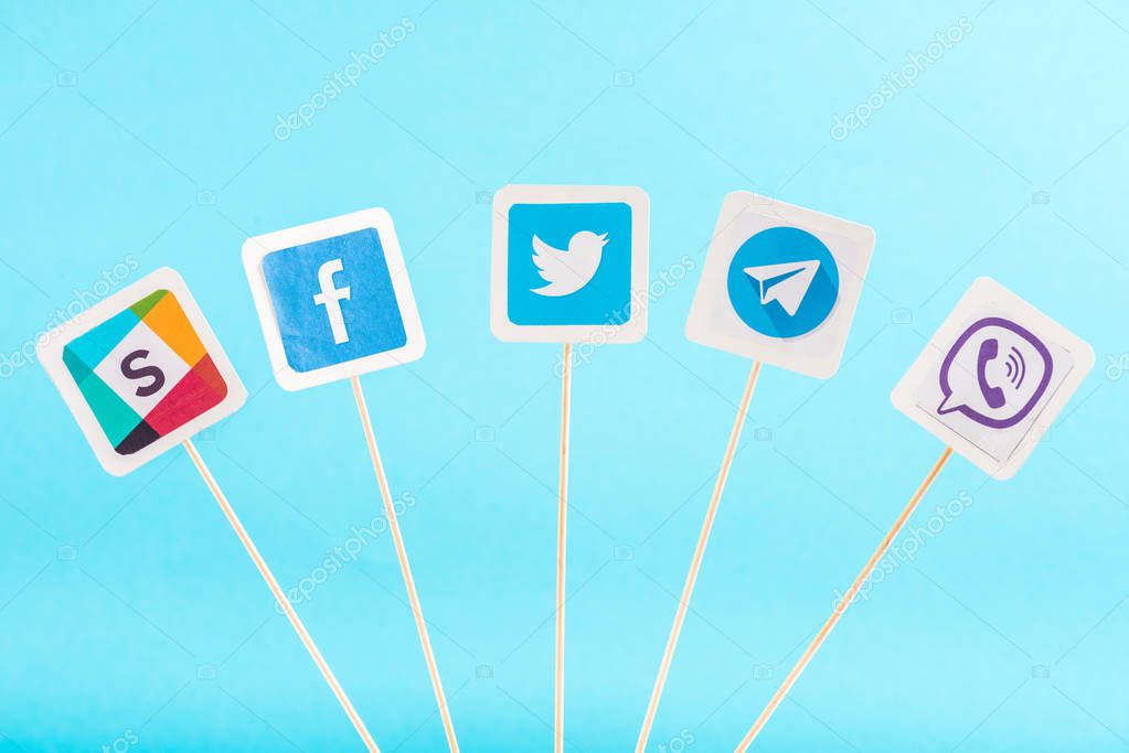 Top view of social media icons isolated on blue