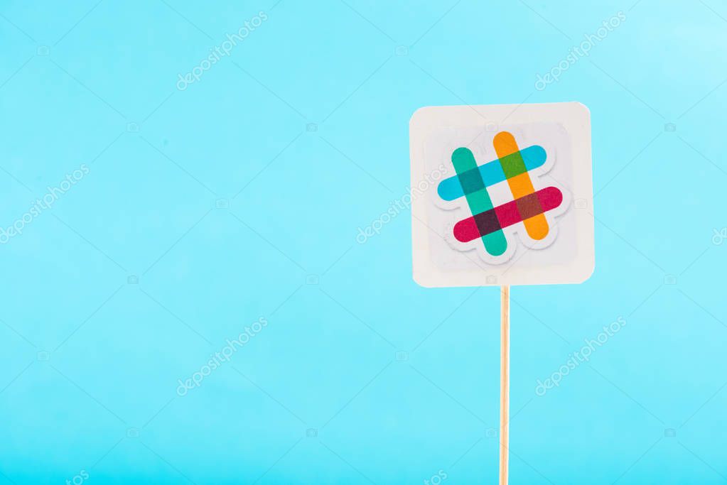 Top view of slack logo isolated on blue with copy space