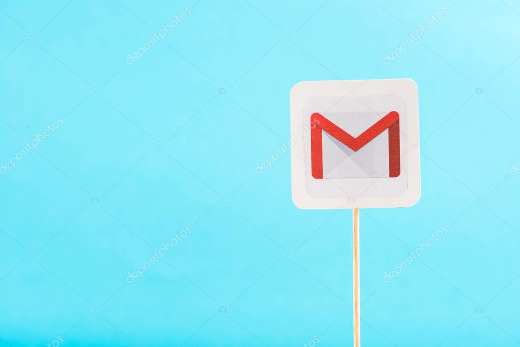 Top view of gmail icon isolated on blue with copy space