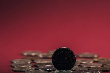 close-up view of russian rubles coins on red background, selective focus   clipart