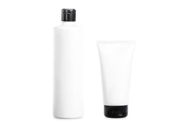 Studio shot of cream tube and bottle of hair conditioner isolated on white clipart