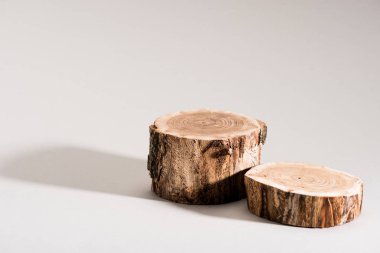 Studio shot of cut wood on grey clipart