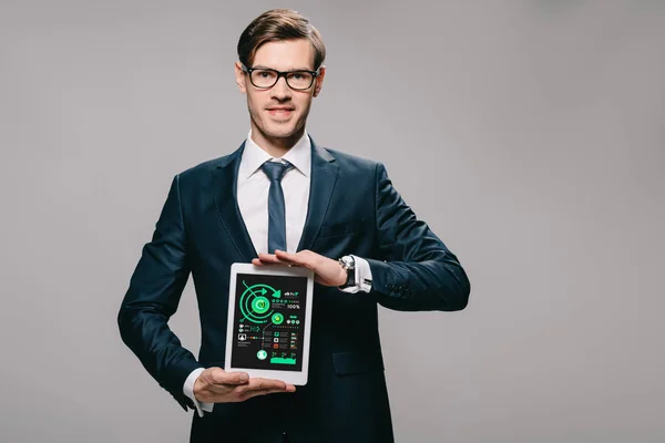 Cheerful Businessman Holding Digital Tablet Charts Screen Isolated Grey — Stock Photo, Image