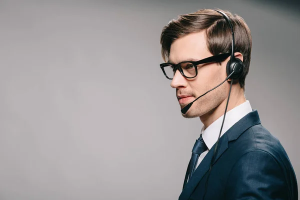 Handsome Man Suit Glasses Wearing Headset Grey Background — Stock Photo, Image