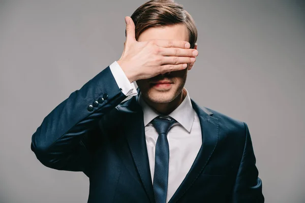 Handsome Businessman Covering Eyes Hand Grey Background — Stock Photo, Image