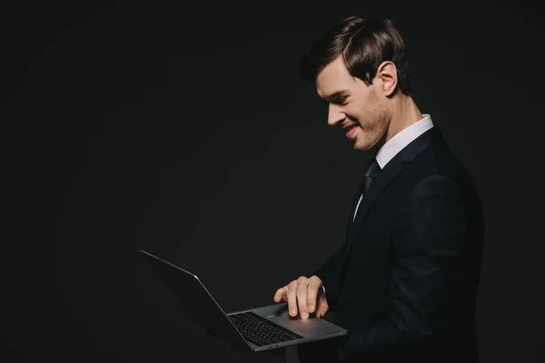 Handsome Businessman Using Laptop Isolated Black — Stock Photo, Image