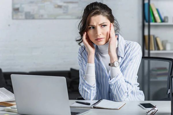 Upset Beautiful Businesswoman Touching Head Looking Camera — Stock Photo, Image