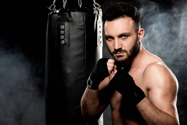 Muscular Fighter Standing Boxing Pose Looking Camera Punching Bag Black — Stock Photo, Image