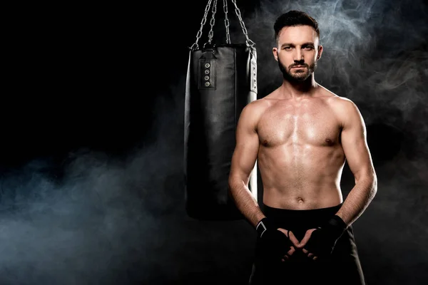 Athletic Shortless Man Standing Punching Bag Black Smoke — Stock Photo, Image