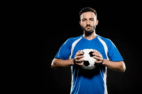 Jogador Futebol Segurando Bola Mãos Isoladas Preto — Fotografia de Stock