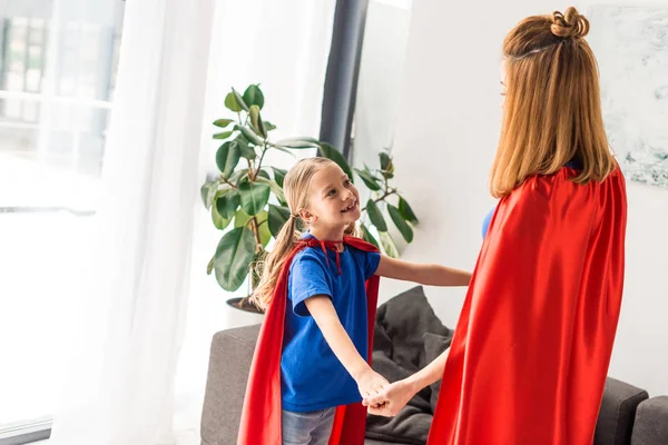 Mother Kid Red Cloaks Smiling Looking Each Other — Stock Photo, Image