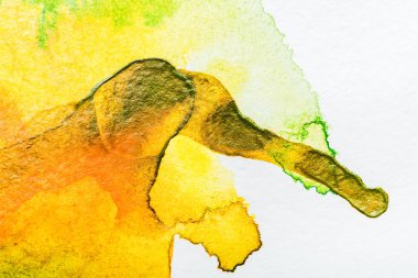 top view of yellow watercolor spill on white background  clipart