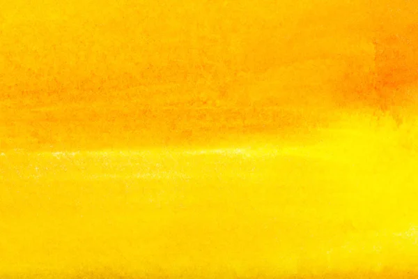top view of yellow watercolor spill with copy space 