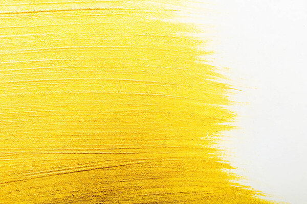 top view of yellow watercolor brushstrokes with on white background 