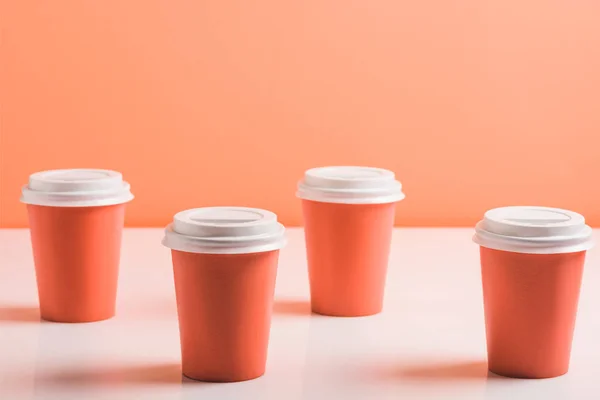 Coral Disposable Cups Coral Background Color 2019 Concept — Stock Photo, Image