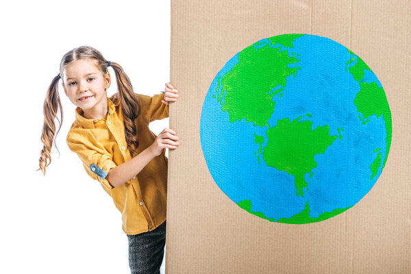 cute child holding cardboard placard with globe sign isolated on white, earth day concept