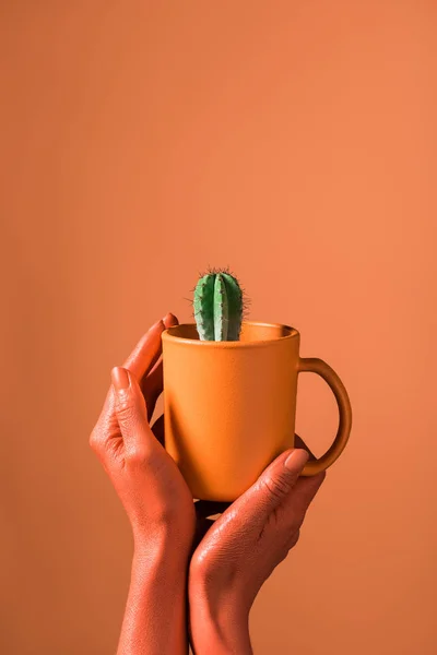 Partial View Woman Holding Coral Coffee Cup Green Cactus Coral — Stock Photo, Image