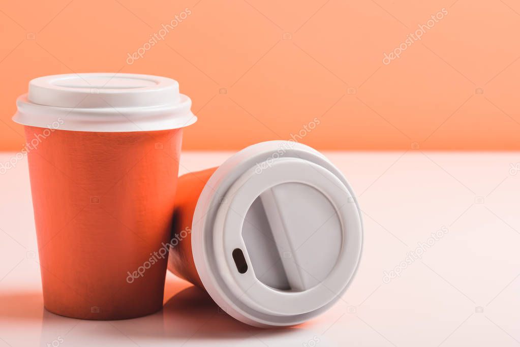 color disposable cups on white surface, color of 2019 concept