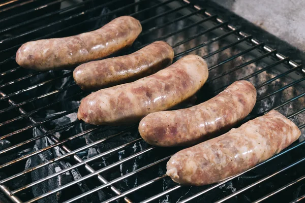 Uncooked Fresh Sausages Cooking Barbecue Grill Grate — Stock Photo, Image