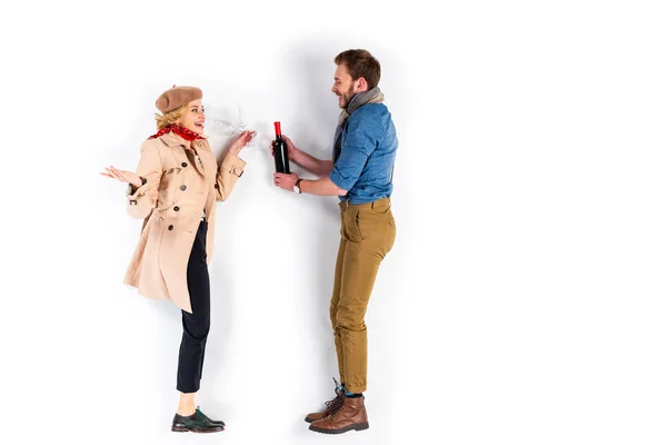 Smiling Man Holding Wine Bottle Looking Girlfriend White Background — Stock Photo, Image