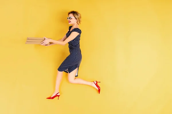 Full Length View Woman Black Dress Holding Pizza Yellow Background — Stock Photo, Image