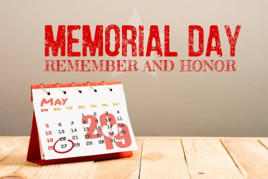 calendar with 27th May 2019 date isolated on beige with memorial day red lettering clipart