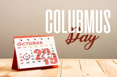 calendar with 14th October 2019 date isolated on beige with Columbus day lettering clipart
