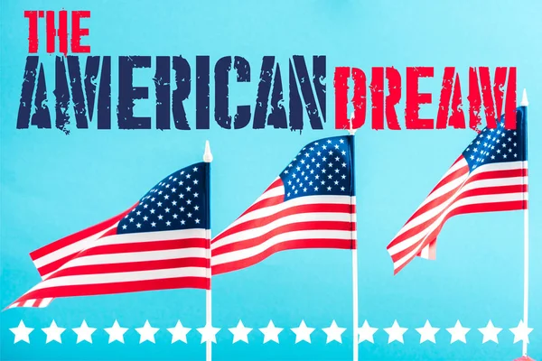 american flags with the american dream lettering and stars on blue
