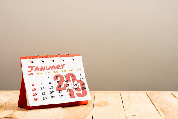 calendar with January 2019 lettering isolated on beige with copy space