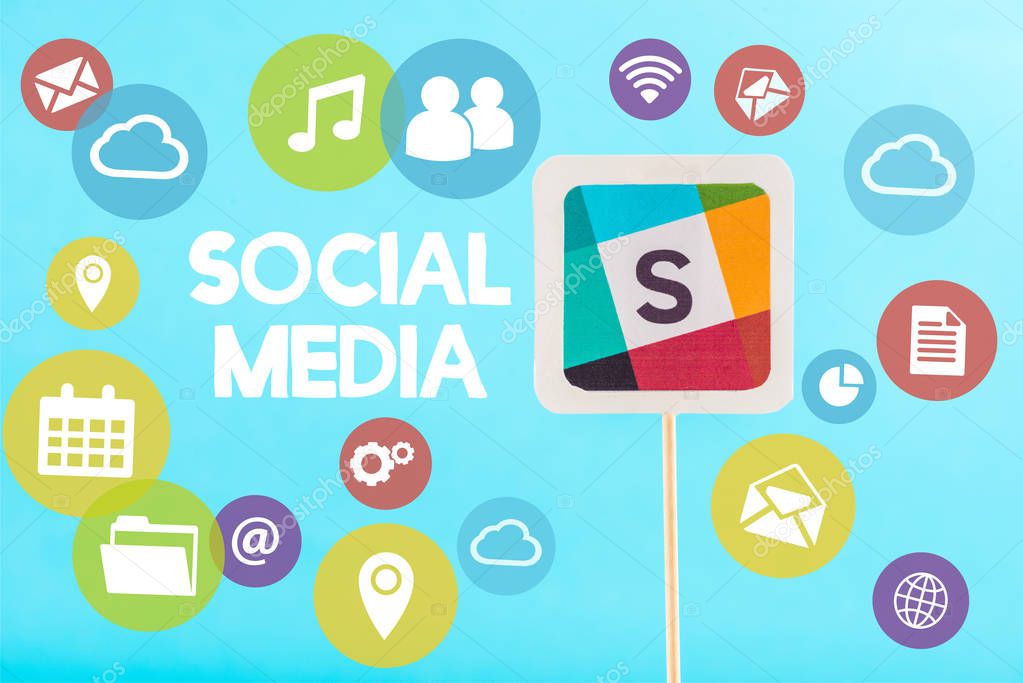 Card with slack logo, social media lettering and icons isolated on blue