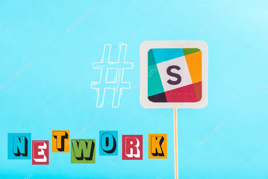 Card with slack logo, network lettering and hashtag isolated on blue