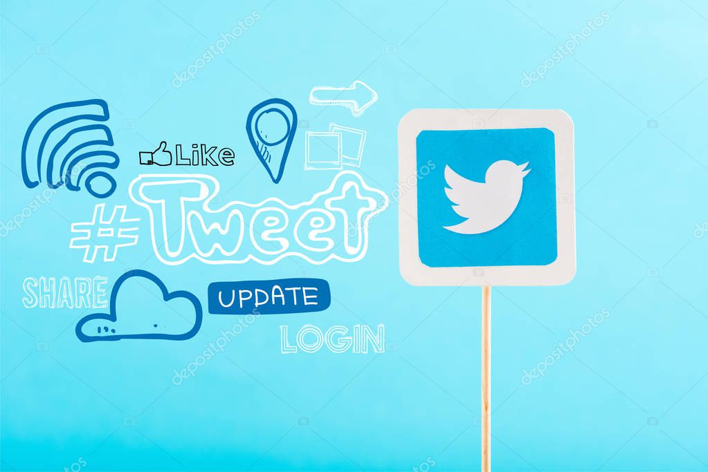 Card with twitter logo and social media icons isolated on blue