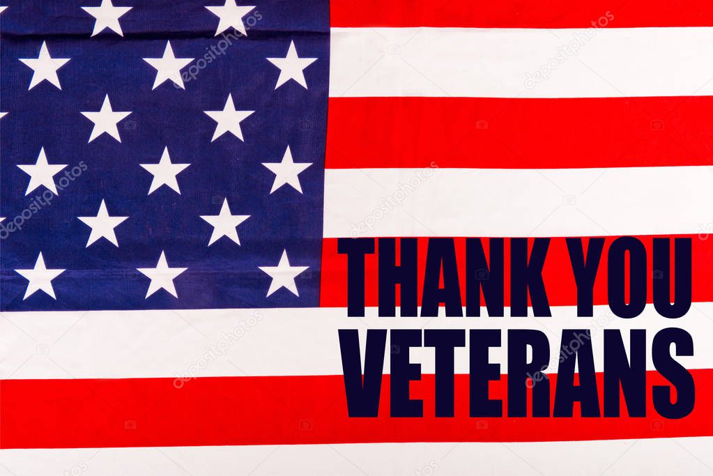 thank you veterans lettering on american flag 