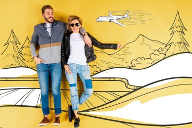 happy woman showing thumb up and hugging boyfriend with mountains and airplane illustration on yellow background clipart