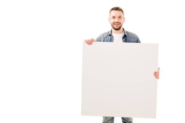 front view of smiling bearded man holding blank placard isolated on white clipart