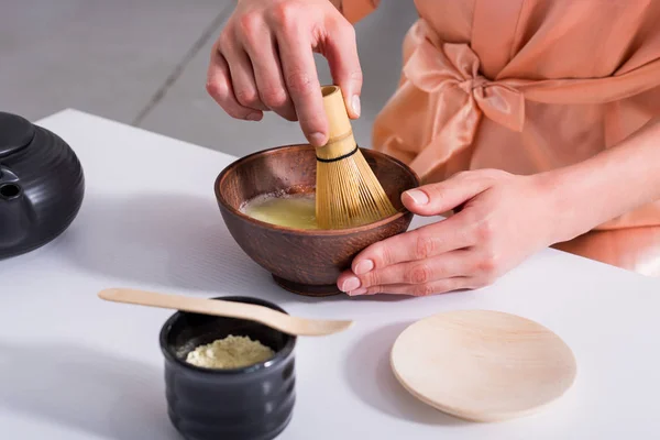 Partial view of woman having tea ceremony in morning at home — Stock Photo