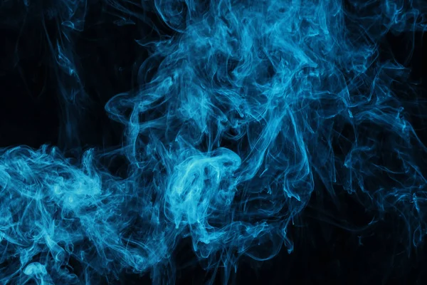 Dark texture with blue mystic steam — Stock Photo