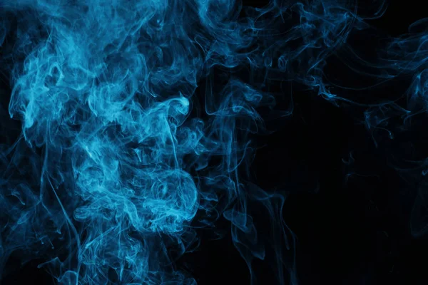 Blue steam on black background with copy space — Stock Photo