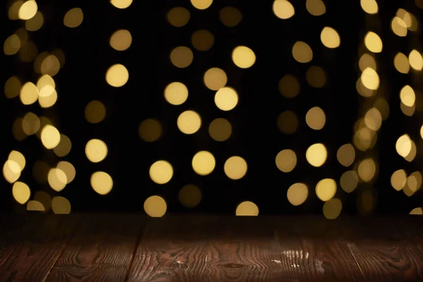 Empty wooden planks surface and beautiful shiny bokeh background — Stock Photo