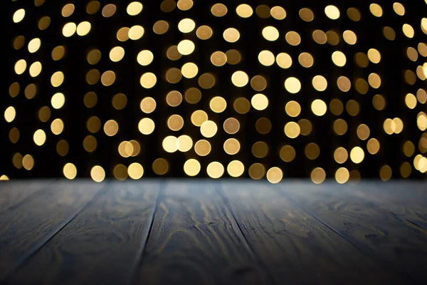 Empty wooden planks and beautiful golden bokeh background — Stock Photo