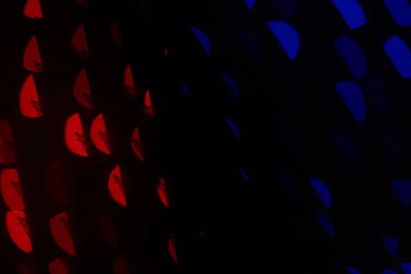 Beautiful dark blue, red and black defocused bokeh background — Stock Photo