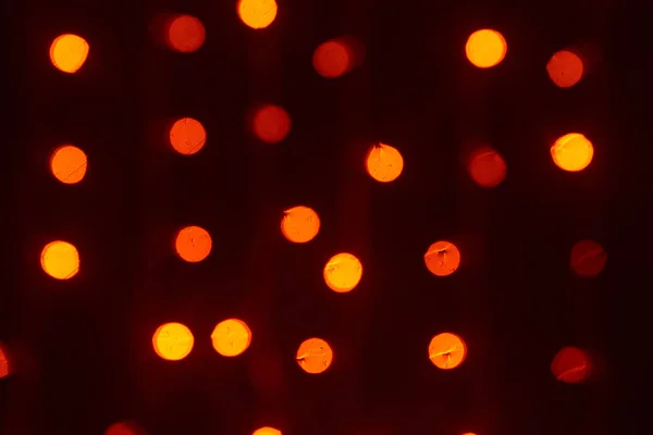 Belles lumières rouges, orange et jaunes brillantes fond bokeh déconcentré — Photo de stock