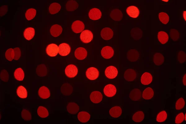 Beautiful dark red defocused bokeh background — Stock Photo