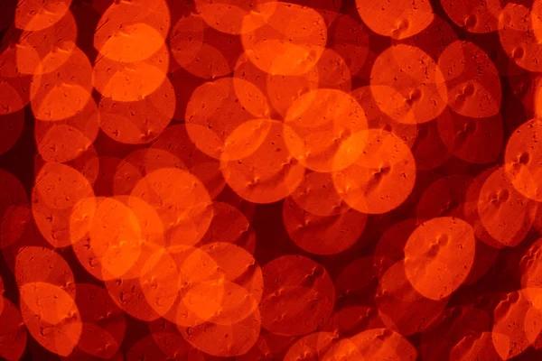 Beautiful shiny orange defocused bokeh background — Stock Photo