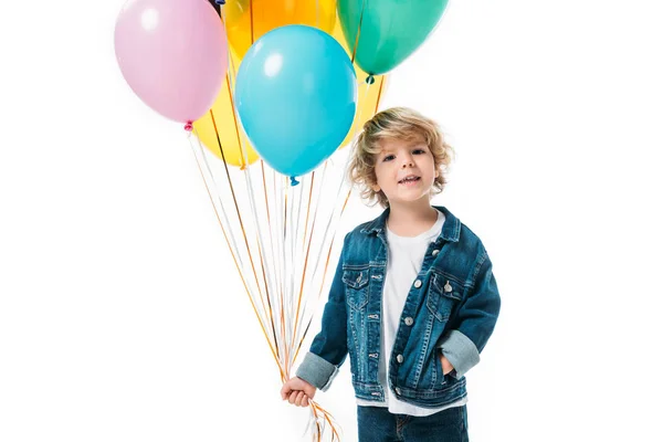 Menino adorável com pacote de balões isolados em branco — Fotografia de Stock