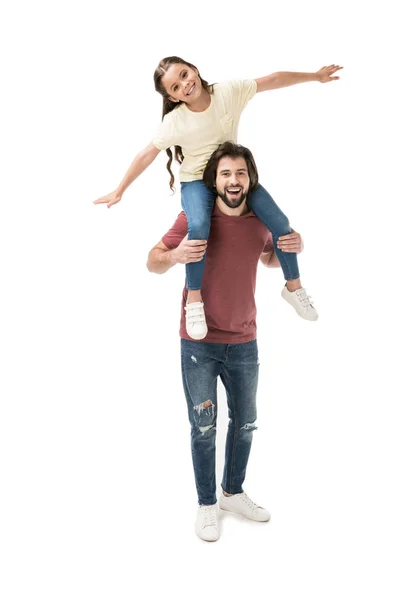 Cheerful daughter sitting on fathers neck isolated on white — Stock Photo