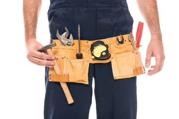 Cropped shot of repairman wearing tool belt isolated on white — Stock Photo