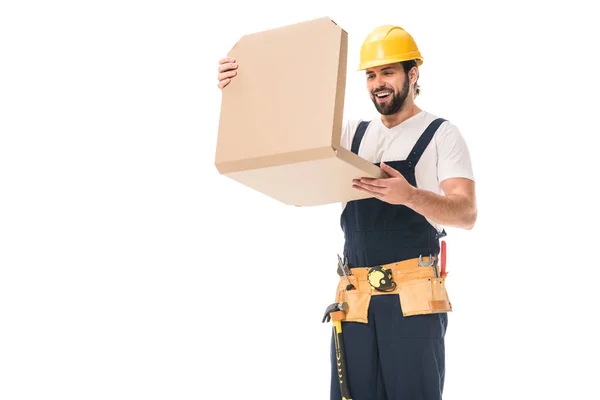 Happy workman in hard hat and tool belt opening pizza box isolated on white — Stock Photo