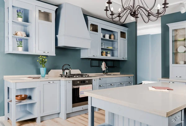 Интерьер современной светлой кухни с белой деревянной мебелью, горшечными растениями и люстрой — стоковое фото