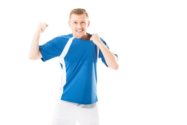 Joven deportista emocionado triunfando y sonriendo a la cámara aislado en blanco - foto de stock